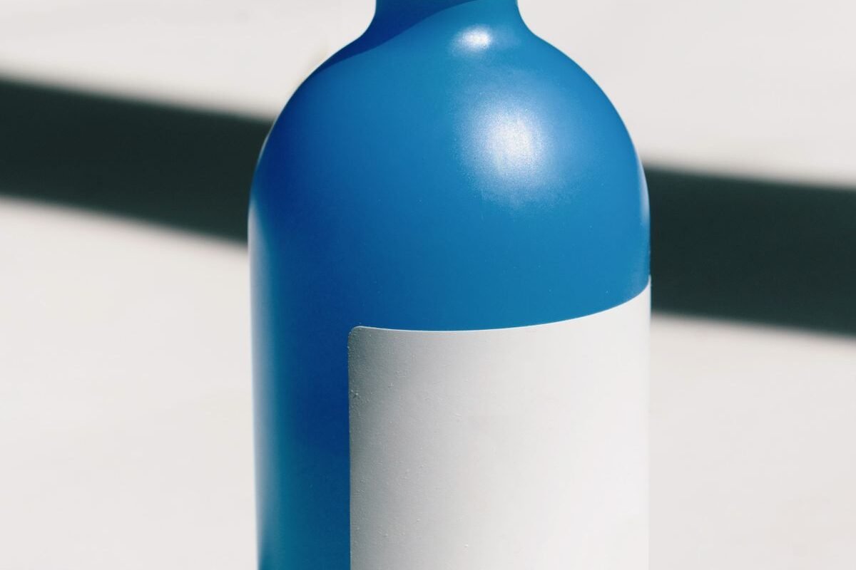 Close-up of a blue AdBlue fluid bottle