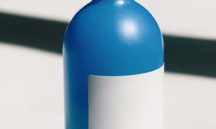 Close-up of a blue AdBlue fluid bottle
