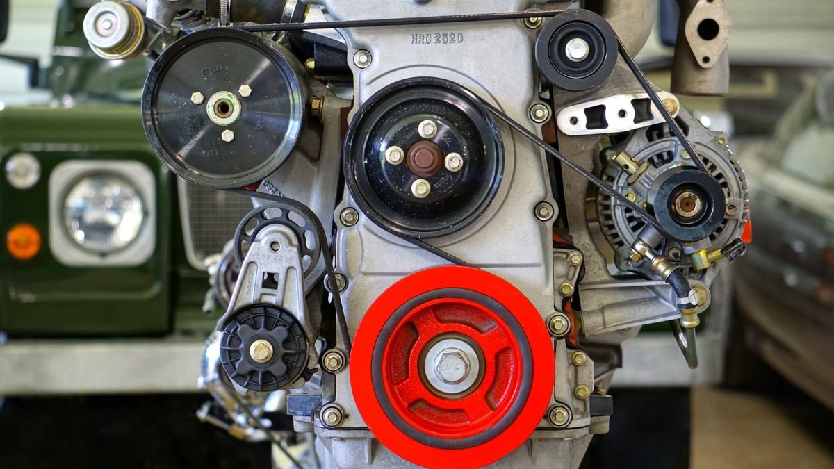 Close-up of engine belts and pulleys