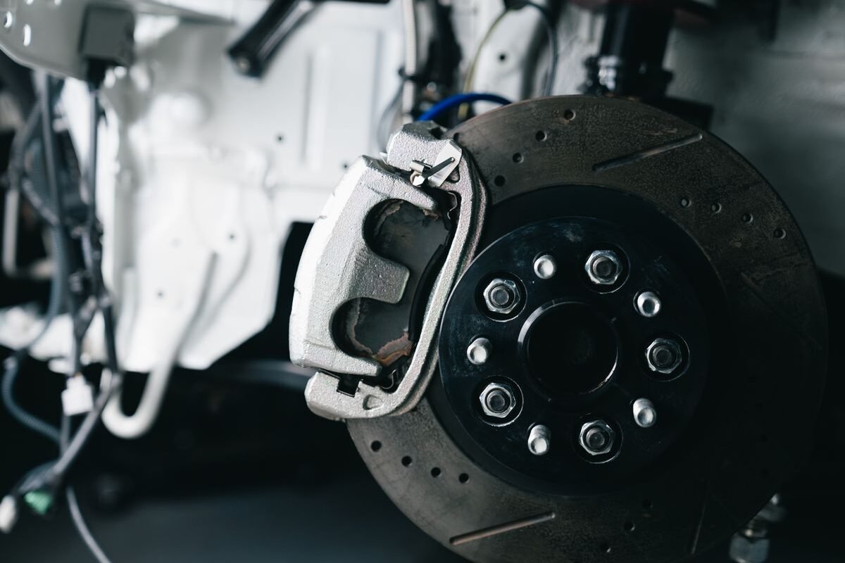 Close-up of a vehicle brake caliper and disc