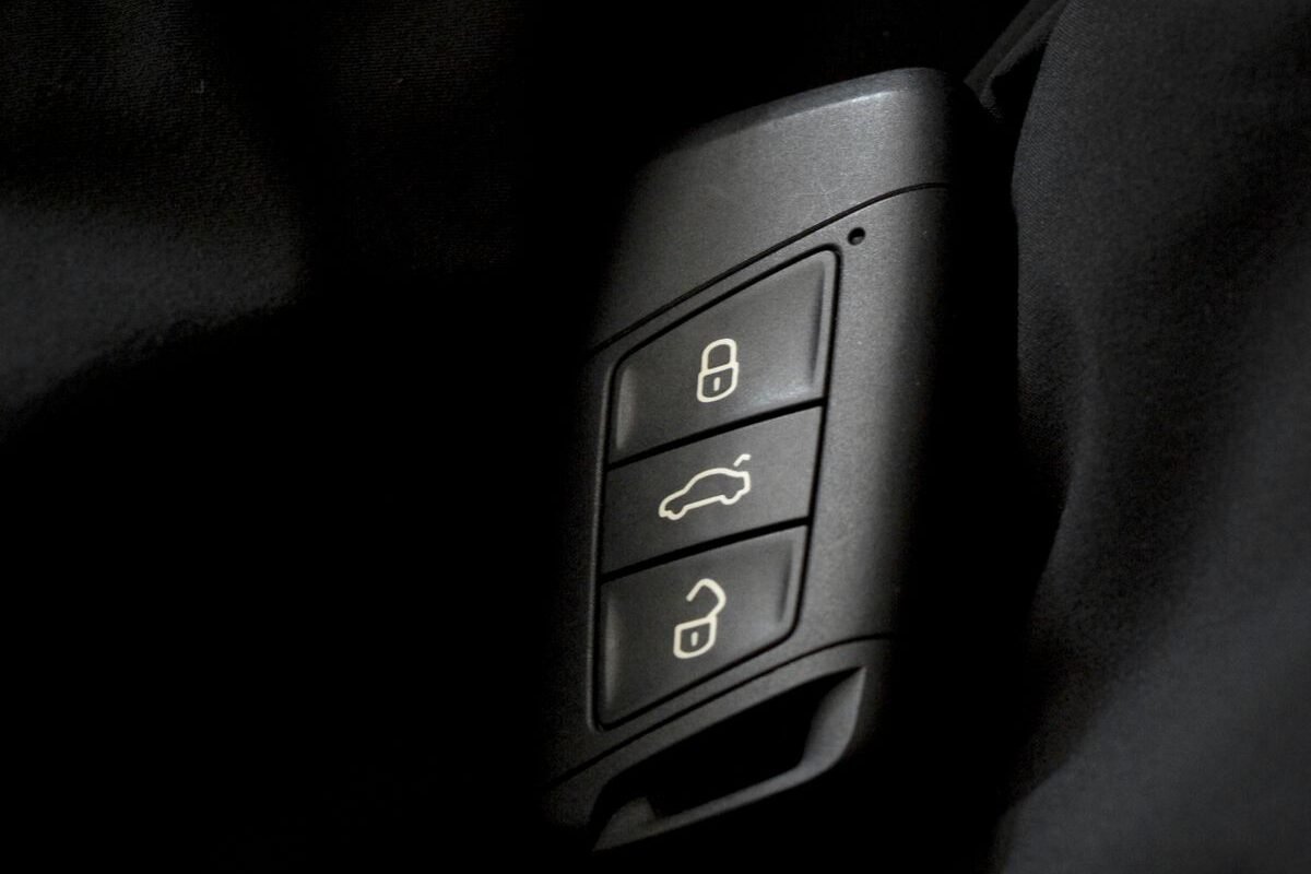 Car key fob showing lock and unlock buttons
