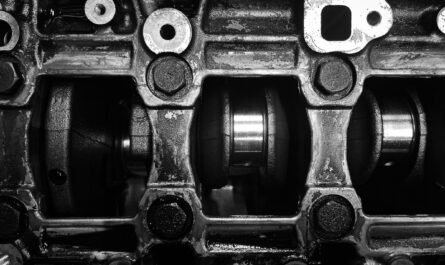 Close-up of a metal engine crankshaft mechanism