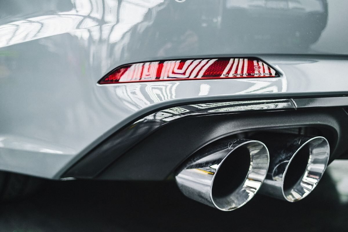 Close-up detail of a car exhaust pipe
