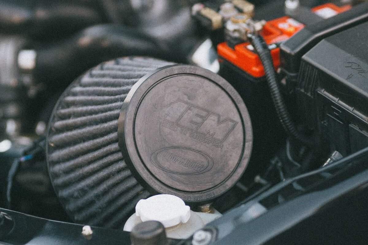 Close-up of a van engine filter and components