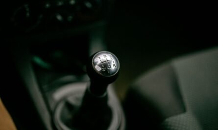Close-up of a manual gear shifter inside a vehicle