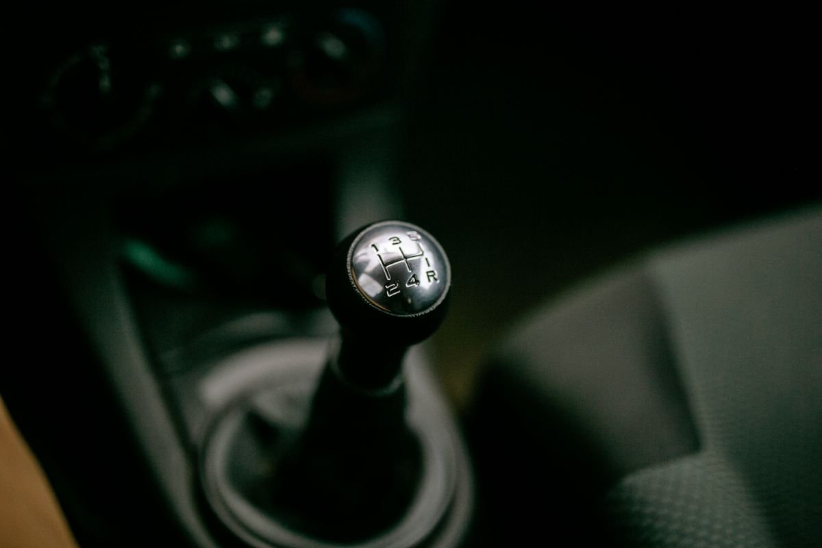 Close-up of a manual gear shifter inside a vehicle