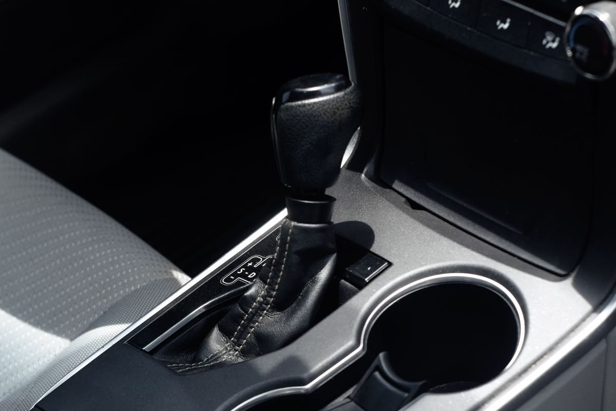 Close-up of a car centre console and handbrake area