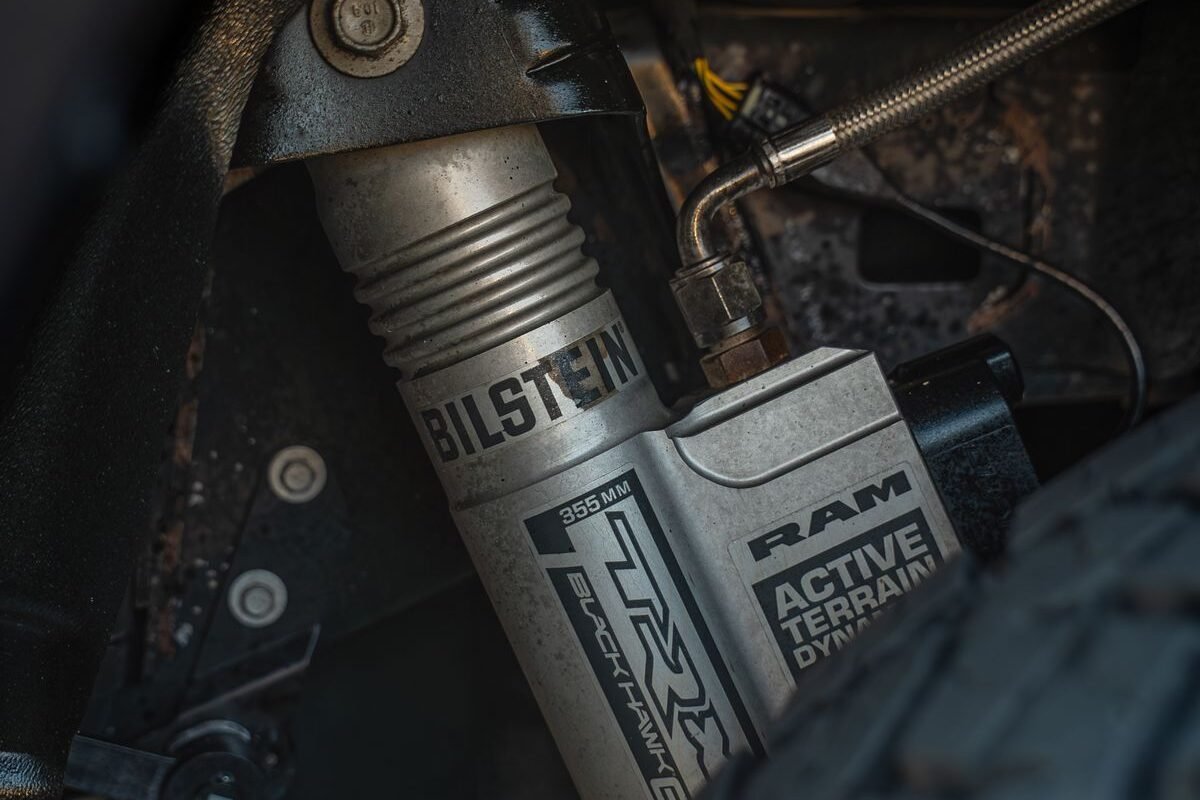 Close-up of a vehicle suspension and shock absorber