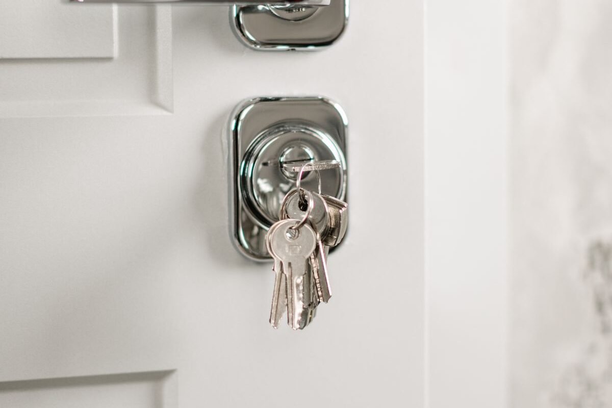 Close-up of a door handle and lock symbolizing vehicle security