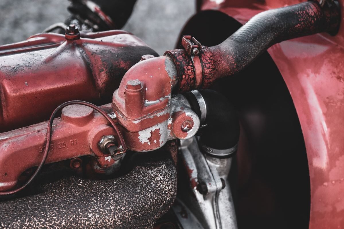 Close-up of an engine with hoses, relevant to cooling system components