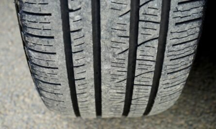 Macro shot of a worn tyre tread showing wear pattern