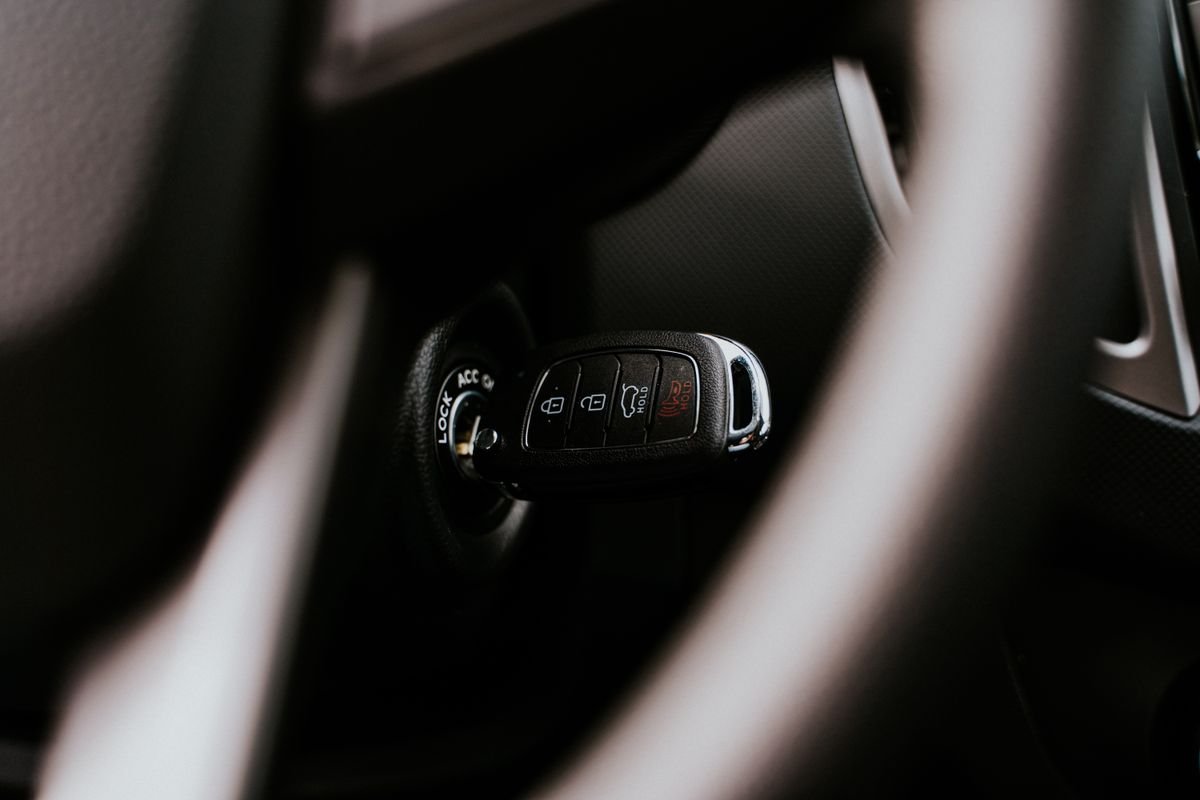 Car key placed in the ignition inside a vehicle